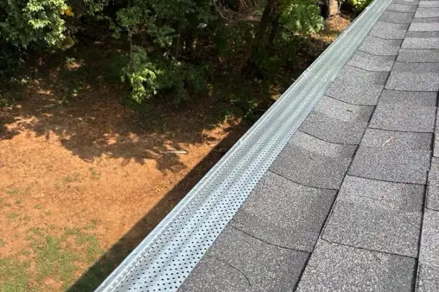 Repair of a home’s gutter and downspout